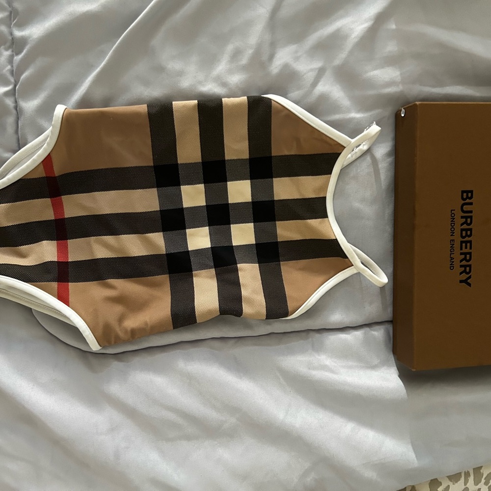 Burberry swimsuit baby. Still have box.